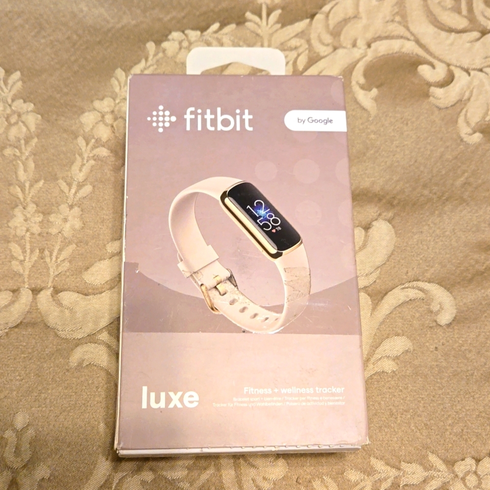 Fitbit Luxe - Soft gold stainless steel activity tracker with lunar white band